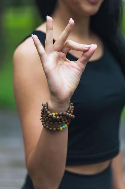 Focus on the alignment of the spine and the grip of the hand in Compass Pose (Parivrtta Surya Yantrasana), highlighting the twist and stretch.