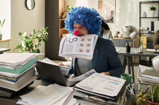 An employee looking stressed and overwhelmed, sitting at a cluttered desk with multiple screens displaying emails and spreadsheets. The person is frowning with a hand on their forehead.