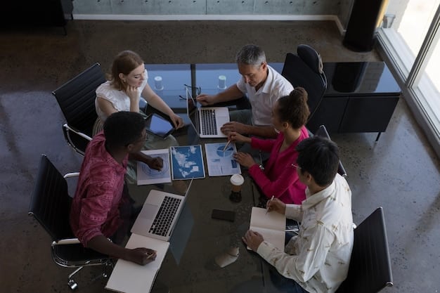 A diverse group of people collaborating on a project, brainstorming ideas, and using technology to solve problems, illustrating the power of teamwork and continuous learning in a professional setting.