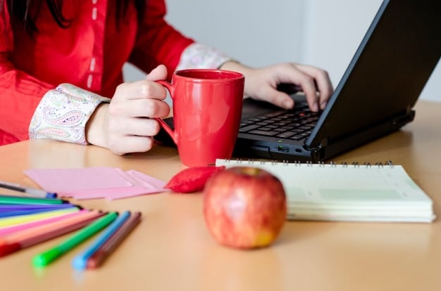 A person studying at a desk with a laptop, surrounded by books and notes, showcasing the focused environment of online learning and the importance of self-discipline.