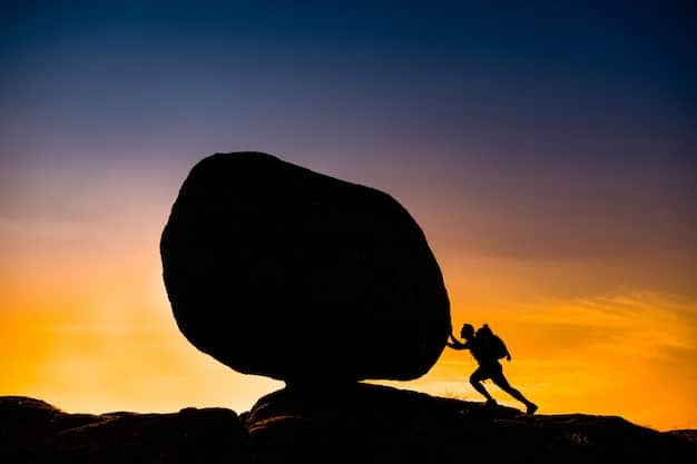 A person successfully climbing over a large boulder on a mountain path, symbolizing overcoming obstacles with determination and a positive mindset.