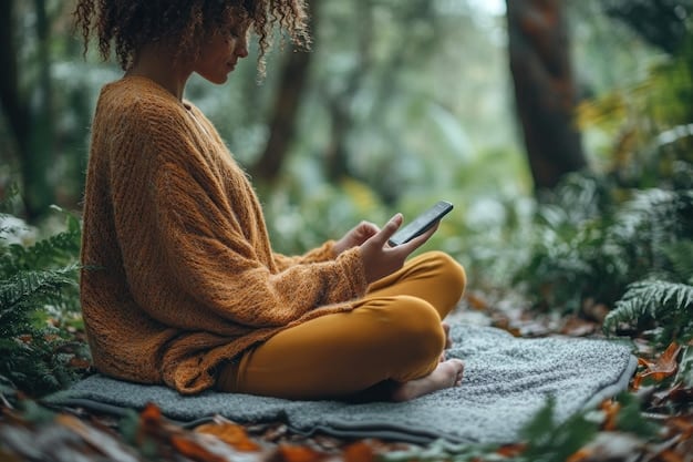 A person meditating outdoors, smartphone resting beside them, showcasing a blend of nature and technology, emphasizing mindful tech usage.