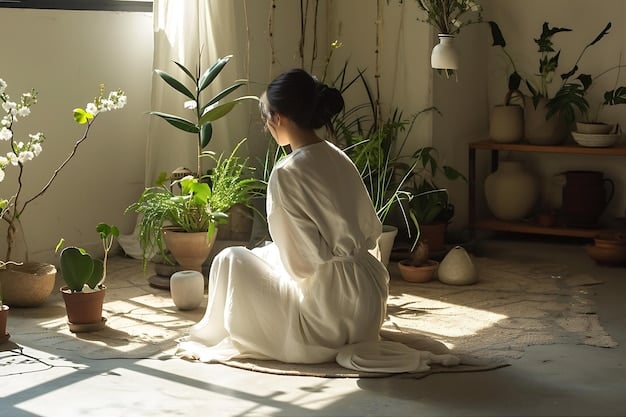 A person sitting on a cushion, eyes closed, meditating in a sunlit room. The room is minimalist with plants and soft lighting.