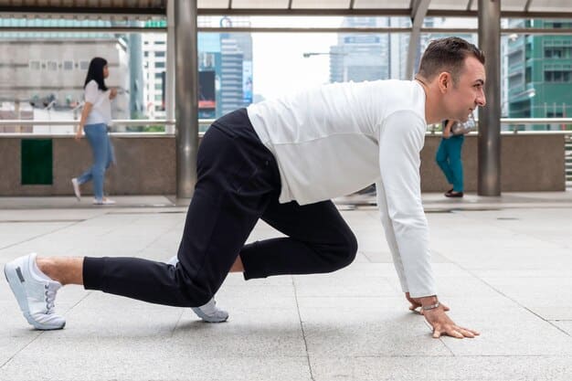 A runner demonstrating a perfect low lunge pose, with emphasis on the alignment of the front knee over the ankle and the stretch in the back hip flexor. The background should be a natural setting, like a park or trail.