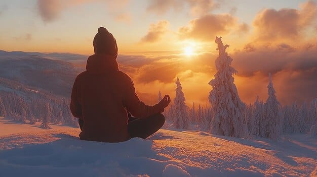 A person sitting in a yoga pose on a mountaintop, visualizing stress melting away like snow in the sun. The person is surrounded by a vibrant sunset, enhancing the feeling of release and renewal.