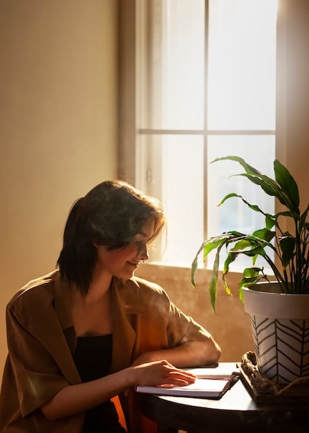 A person writing in a journal, reflecting on their emotions and experiences. Calm and peaceful setting.