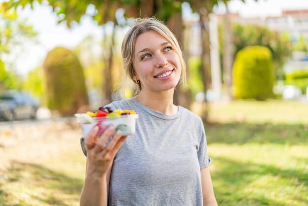 A person enjoying a healthy and colorful meal outdoors, representing the importance of nutrition in self-care.