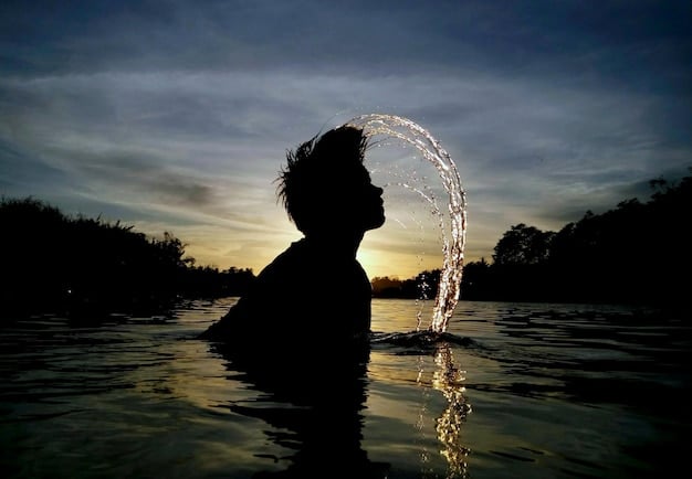 A person meditating by a flowing river, symbolizing the constant stream of thoughts and the acceptance of impermanence, finding peace and tranquility in the face of change.