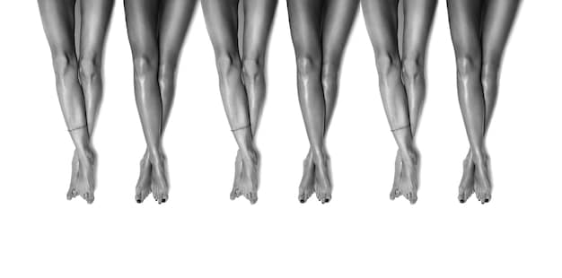 A close-up shot of hands and feet properly aligned in downward-facing dog, showcasing the engagement of muscles and the straight line from wrists to hips.