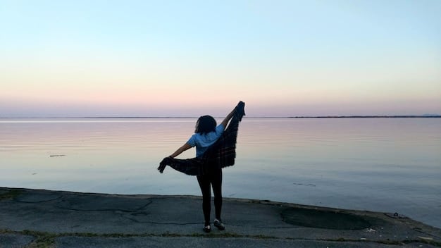 A person transitioning gracefully through the Sun Salutation sequence outdoors at sunrise, capturing the flowing energizing process and its effect on the metabolism, with vibrant colors and detailed muscle engagement..
