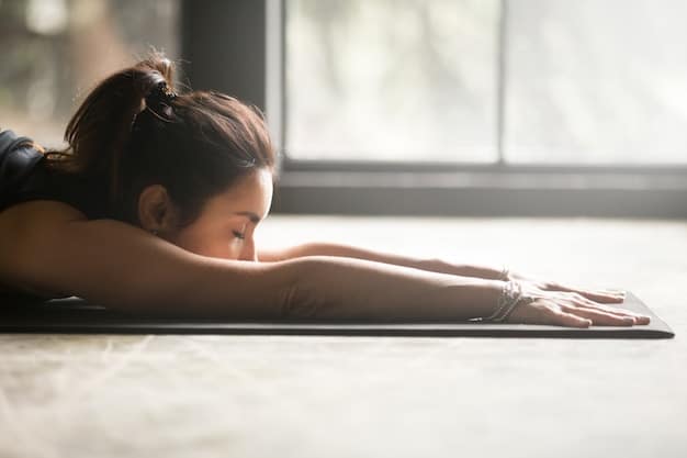 A close-up shot of someone in a child's pose during yoga, emphasizing the posture's calming and grounding effect.