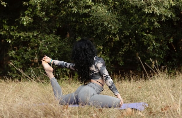 A serene yoga instructor demonstrating the Cobra Pose in a natural, outdoor setting with lush greenery. She is wearing comfortable athletic clothing, and the pose highlights her back flexibility and strength.