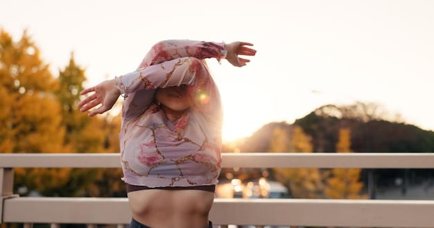 A person practices yoga poses outdoors at sunrise, wearing athletic clothing, with a blurred natural background, and the focus of the shot emphasizes body alignment and peace.
