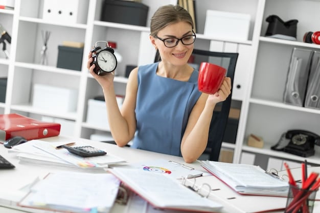 A person sitting at a desk with a timer on it, using the Pomodoro Technique with focus, illustrating effective time management and concentration on the work task.
