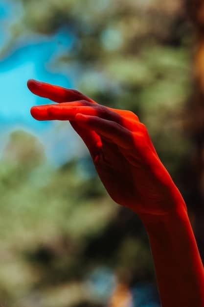 A close-up of a person's hand gently pushing away another person's hand reaching out, symbolizing the act of setting a boundary with kindness and respect. The background is soft and blurred.