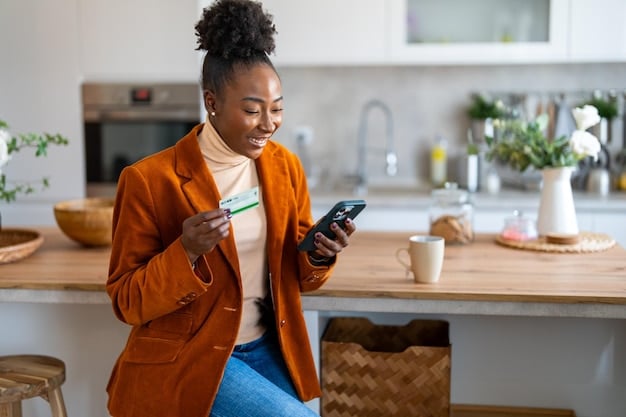 A person smiling while checking their bank account balance on their phone, emphasizing the positive feeling of seeing savings grow.