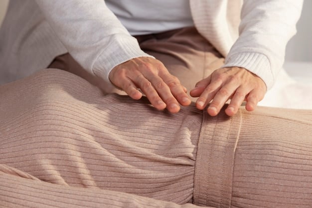 A close-up of hands gently resting on a person's stomach as they practice deep breathing during a progressive muscle relaxation session. The focus is on calmness and inner peace.