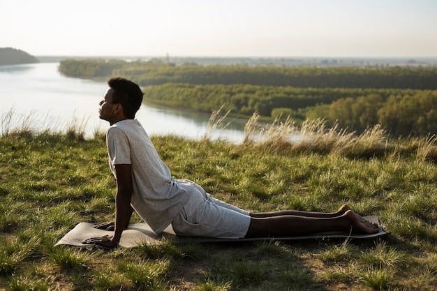 A person practicing yoga in a peaceful environment, illustrating a stress management technique.