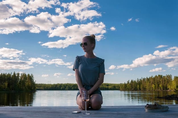 A person meditating by a calm lake, with a serene expression, representing mindfulness and emotional regulation as key factors in building resilience.