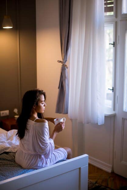 A blackout curtain in a bedroom, completely blocking external sunlight. The image should emphasize the darkness and tranquility of the room, highlighting the positive impact on sleep quality.