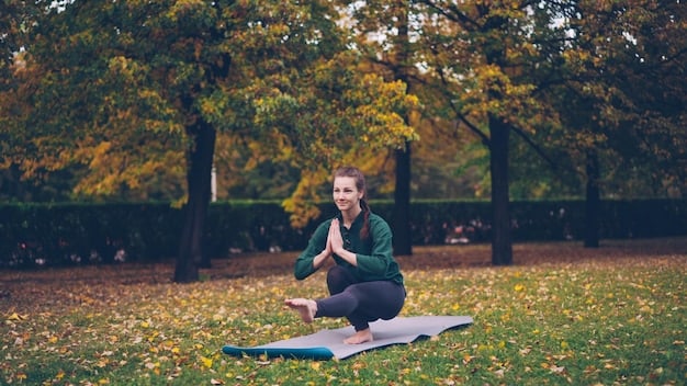 A person doing yoga or meditating in a peaceful outdoor setting, symbolizing stress relief and mindfulness.