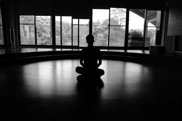 A serene yoga studio with a person meditating in a lotus position. The scene is calm and focuses on the practice of mindfulness.