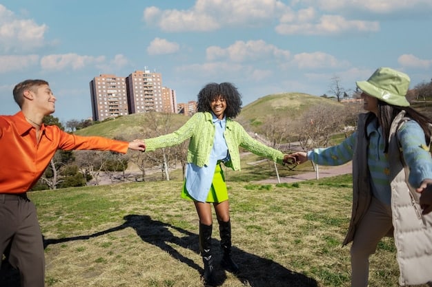 A diverse group of people supporting each other, emphasizing the importance of social connections and community in building resilience. The setting is a park, suggesting a connection with nature.
