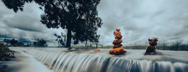 A person meditating in a peaceful environment, symbolizing the practice of mindfulness and its role in building resilience. The scene includes natural elements like trees and water.