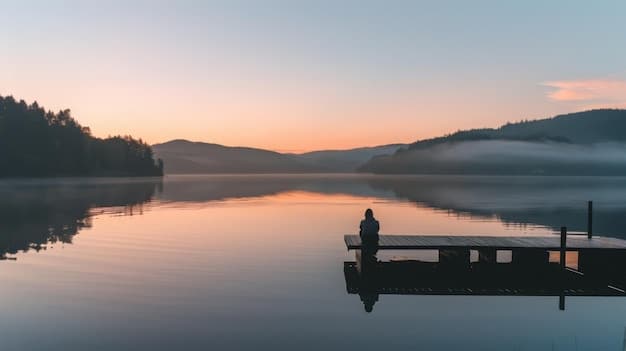 A serene landscape with mountains in the background and a calm lake in the foreground. The image evokes feelings of peace, tranquility, and gratitude for the beauty of nature.