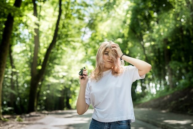A person enjoying a peaceful walk in a park, surrounded by lush greenery and natural light. They are smiling and appear content.