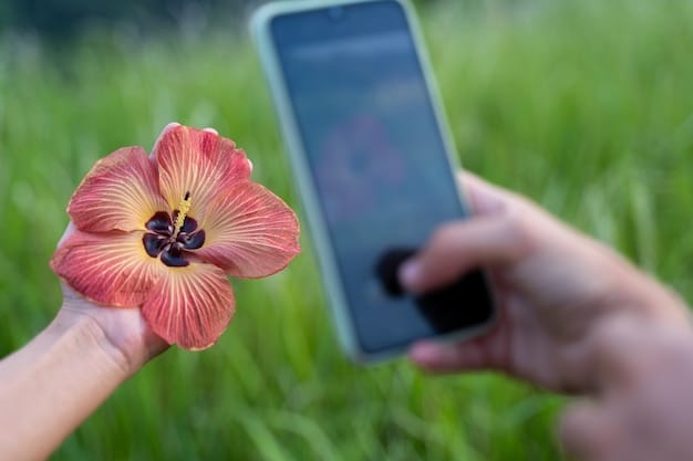 A close-up shot of a smartphone screen displaying a mindfulness app or a calming nature scene, with hands gently holding the phone. The background is blurred, focusing on the device and hands to convey the concept of using technology for mindfulness.