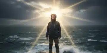 Persona resiliente frente a un mar tormentoso y soleado, simbolizando la adaptación al cambio inesperado.